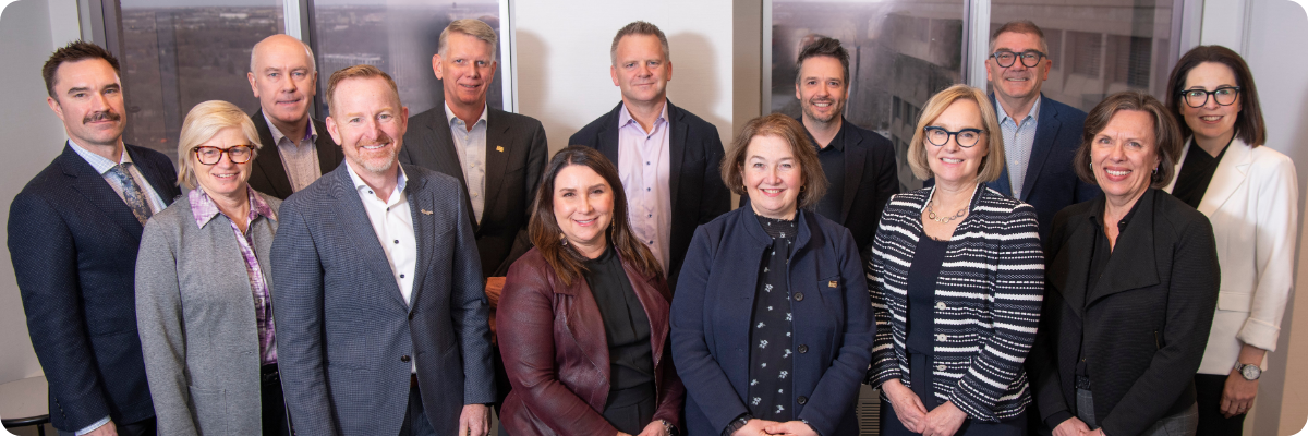 Members of the CPA Manitoba Board stand in two rows for a group photo.